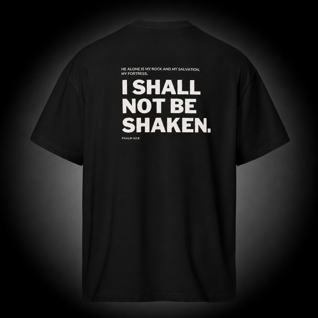 Steady Christian T-Shirt featuring Psalm 62:6 Bible verse "I Shall Not Be Shaken" design on a premium black cotton tee